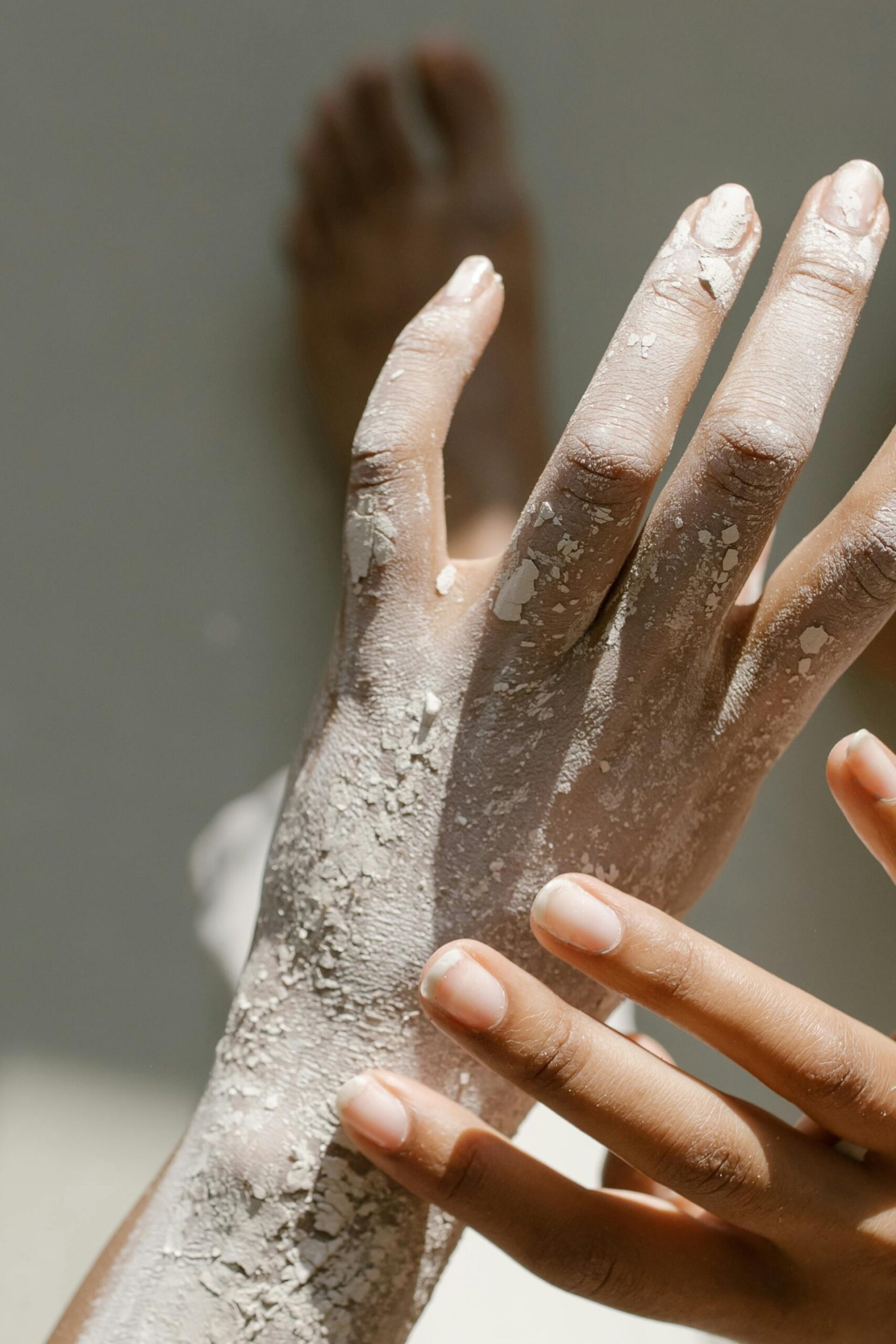 flaky dry skin texture close up showing dry patches and peeling skin in soft natural light
